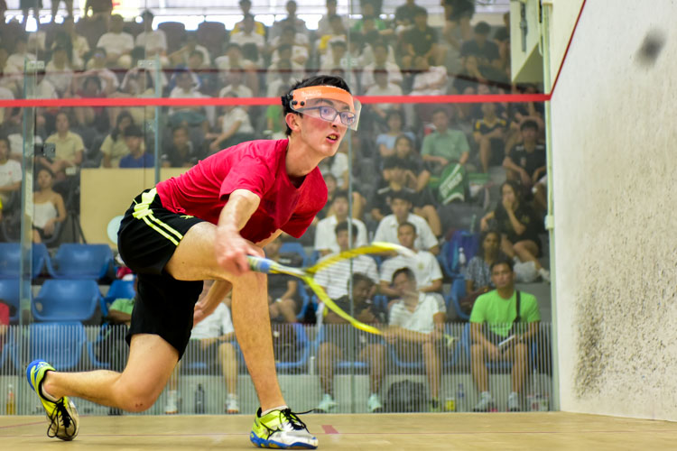 HCI’s Lorcan Timothy Murphy in action during his match against RI’s Tan Izhi. (Photo © Stefanus Ian/Red Sports)