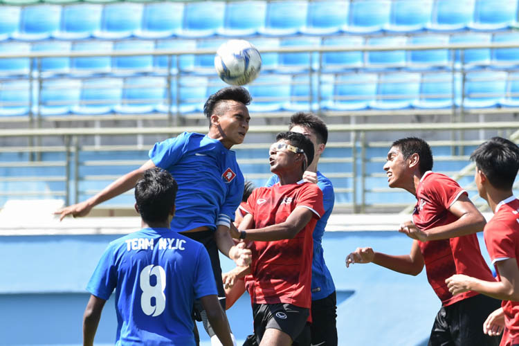 In one of the season’s most exciting matches, Nanyang Junior College (NYJC) narrowly edged out Millennia Institute (MI) on penalties, after the game ended 1-1 in normal time, to retain its third placing in this year’s National A Division Football Championship. (Photo © Stefanus Ian/Red Sports)