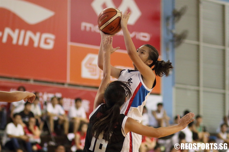 An AJC player rises for a shot in the lane. (Photo 8 © Dylan Chua/Red Sports)