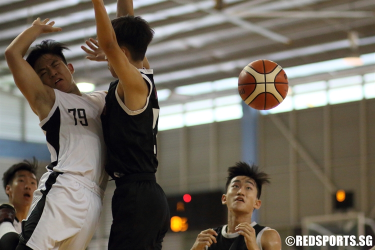 Avner Tan (CJC #79) has the ball deflected out of his hands as he goes for a lay-up. (Photo 7 © Dylan Chua/Red Sports)