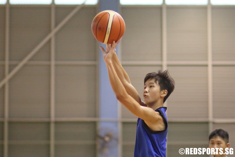 Darryl Chan (#28)shoots a three-pointer. Darryl scored 10 points against NYJC. (Photo 5 © Dylan Chua/Red Sports)