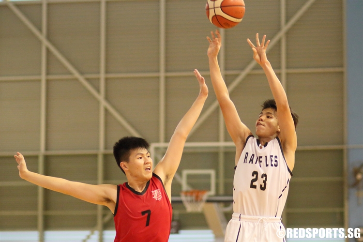 Chen Bin Li (RI #23) shoots a three-pointer against HCI. (Photo 8 © Dylan Chua/Red Sports)