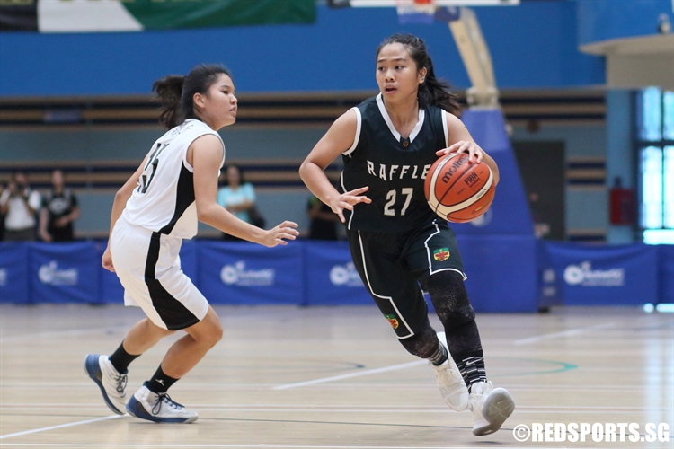 Patricia Orenza (RI #27) slashes past her defenser to the hoop. She finished with a team-high 11 points. (Photo  © Chan Hua Zheng/Red Sports)