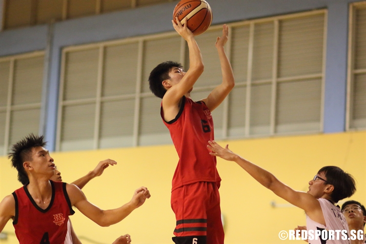 Travis Thong (HCI #6) elevates for a floater over the defense. (Photo  © Chan Hua Zheng/Red Sports)