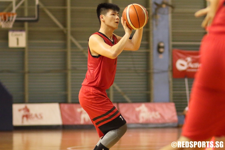 Kenneth Koh (HCI #7) lines up a three. (Photo  © Chan Hua Zheng/Red Sports)