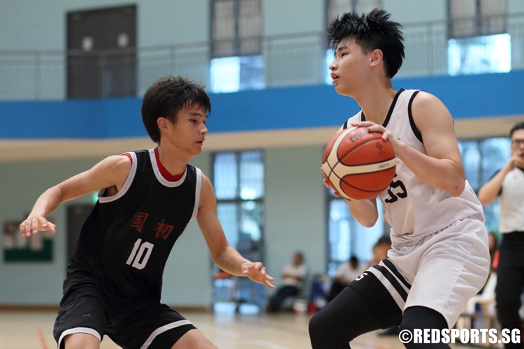 Vernen Lim (HCI #35) looks to take a jump shot. He scored 10 points against NJC.  (Photo 5 © Dylan Chua/Red Sports)