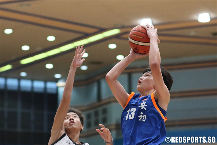 Xavier Ng (AJC #13) rises for a bank shot to score two of his game-high 18 points. (Photo 1 © Dylan Chua/Red Sports)