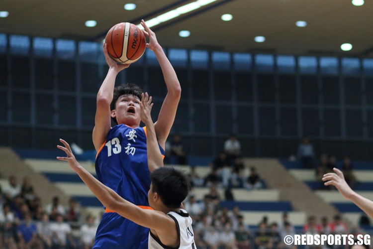 Xavier Ng (AJC #13) rises for a jump shot. (Photo 12 © Dylan Chua/Red Sports)