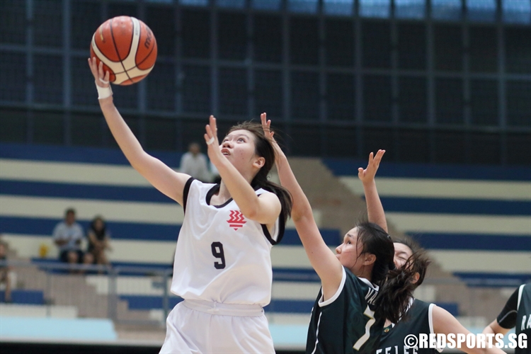 Tan Li Qi (HCI #9) rises for a lay-up in transition. (Photo 5 © Dylan Chua/Red Sports)