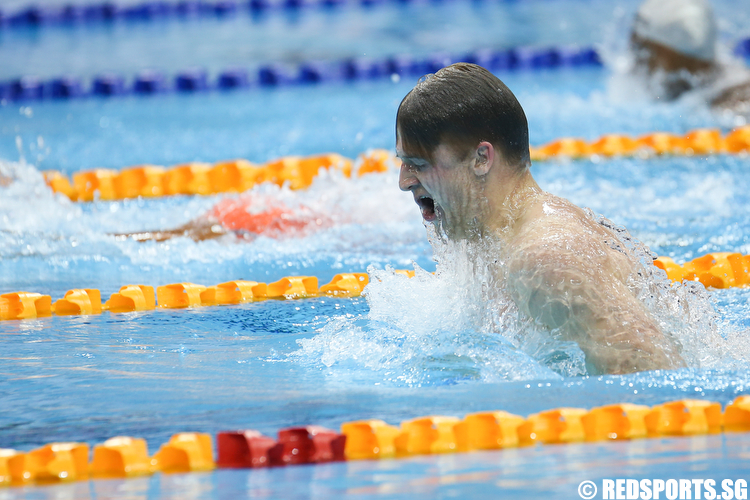 Samuel Williamson representing Swimming Victoria clocked a time of 1 minute 2.06 seconds to clinch the gold medal and setting a new meet record in the Men's 100m Breaststroke Finals. (Photo © Lee Jian Wei/Red Sports)
