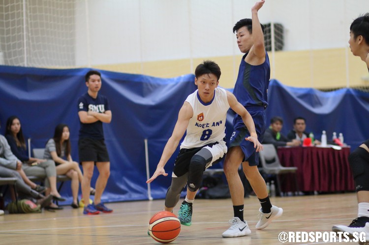 Sia Wei Hng (NP #8) slashes past his defender on a baseline drive. (Photo  © Chan Hua Zheng/Red Sports)