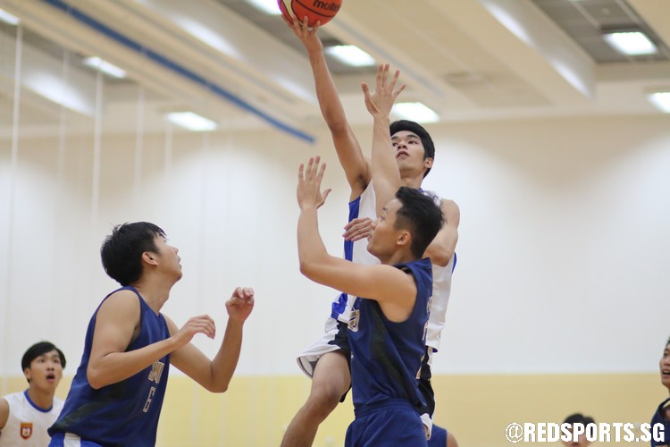 Sean Tiah  (NP #10) elevates over the defense for a lay-up. He finished with a team-high nine points. (Photo  © Chan Hua Zheng/Red Sports)