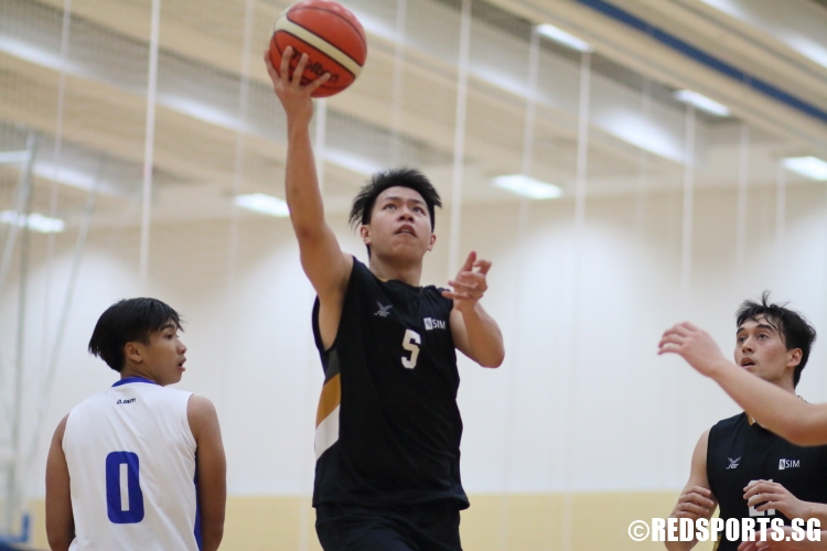 Loh You Ren (SIM #5) rises for a lay-up. He finished the game with 12 points. (Photo  © Chan Hua Zheng/Red Sports)