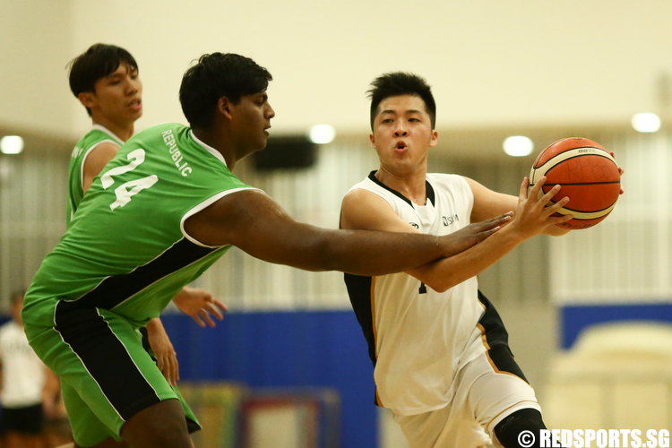 (#14) of Singapore Institute of Management drives against V Lavin Raj (#24) of Republic Polytechnic. (Photo © Lee Jian Wei/Red Sports)