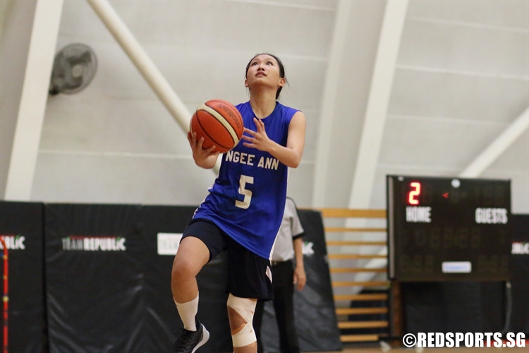 Leong Le Yi (NP #5) rises for a lay-up in transition. (Photo  © Chan Hua Zheng/Red Sports)
