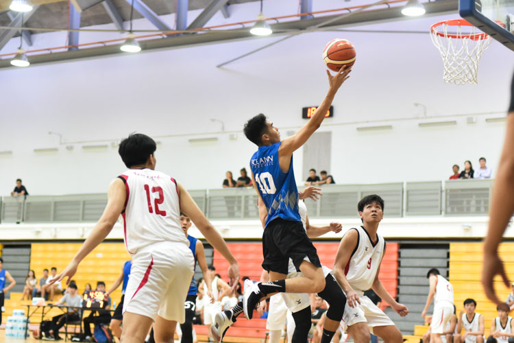 Sean Tiah making a lay up during the match between Temasek Polytechnic  and Ngee Ann Polytechnic. (Photo 1 © Stefanus Ian/Red Sports)