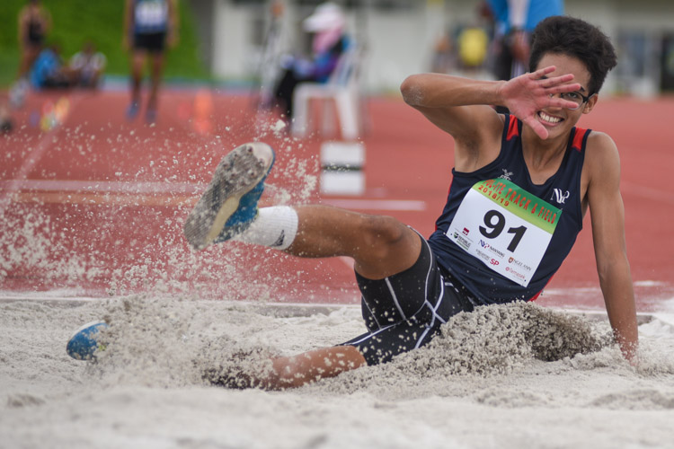 Muhammad Putera of Nanyang Polytechnic competing in the Men's Triple Jump Open event. (Photo © Stefanus Ian/Red Sports)