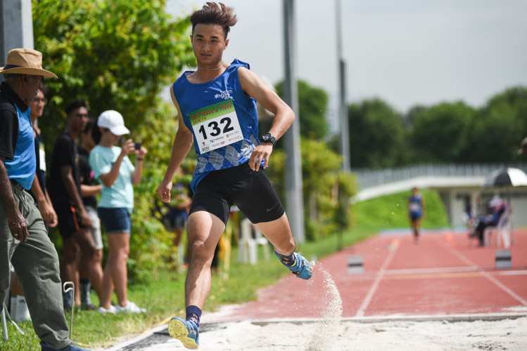 Shawn Jong of Ngee Ann Polytechnic aborting a jump attempt during the Men Triple Jump Open event. (Photo © Stefanus Ian/Red Sports)