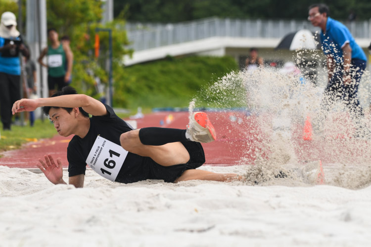 Chan Zhe Ying (#161) of NUS won the Men's Triple Jump event with a distance of 14.40m. (Photo 1 © Stefanus Ian/Red Sports)
