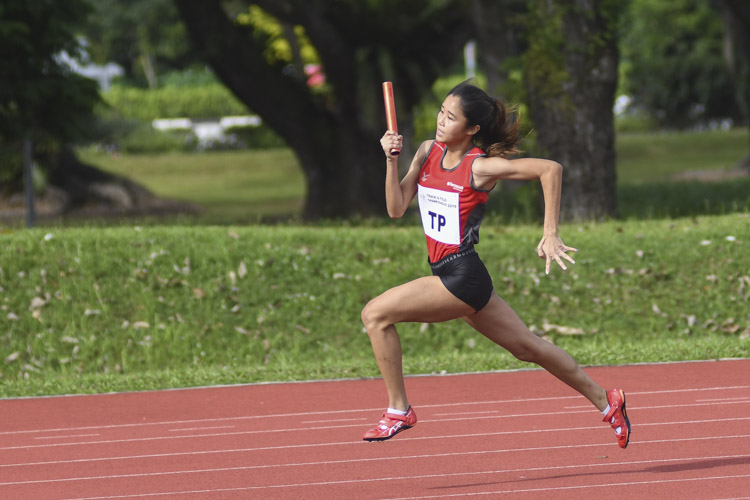 Clara Goh of Temasek Polytechnic running the third leg of the Women's 4x100m relay. TP won the race with a time of 50.76s. (Photo 3 © Stefanus Ian/Red Sports)