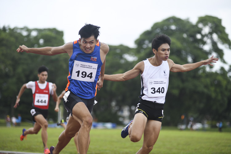 Timothee Yap (#194) of NUS won the Men's 200m race by 0.04s, stopping the clock at 21.65s as Tan Zong Yang (#340) of SMU came in second at 21.69s. (Photo 1 © Stefanus Ian/Red Sports)
