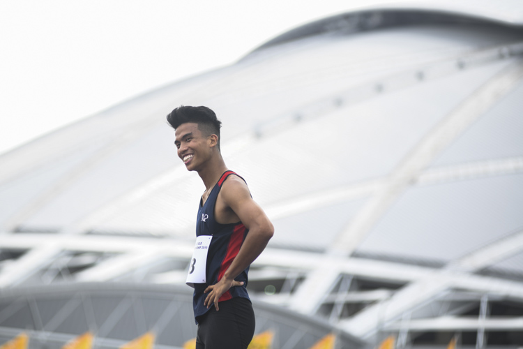 Hairul Syamil reacting after failing to clear the 2.05m height that would have broken the 10-year-old IVP record of 2.04m set by his current coach Ronnie Cai in 2009. Hairul still won the IVP gold medal for Men's High Jump with a final height of 2.00m (Photo 1 © Stefanus Ian/Red Sports)
