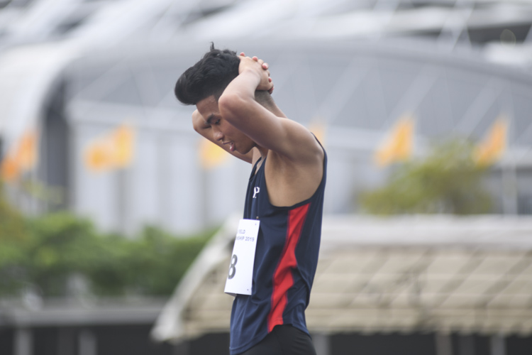 Hairul Syamil reacting after failing to clear the 2.05m height that would have broken the 10-year-old IVP record of 2.04m set by his current coach Ronnie Cai in 2009. Hairul still won the IVP gold medal for Men's High Jump with a final height of 2.00m (Photo 1 © Stefanus Ian/Red Sports)