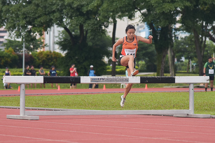 Lok Xin Ying of NUS clinched gold in the Women's 3000m Steeplechase race with a time of 13:09.91. (Photo 1 © Iman Hashim/Red Sports)