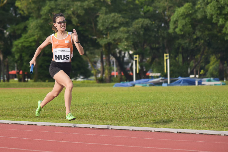 Rachel Ho of NUS on the third leg in the women's 4x400m relay final. (Photo 8 © Iman Hashim/Red Sports)
