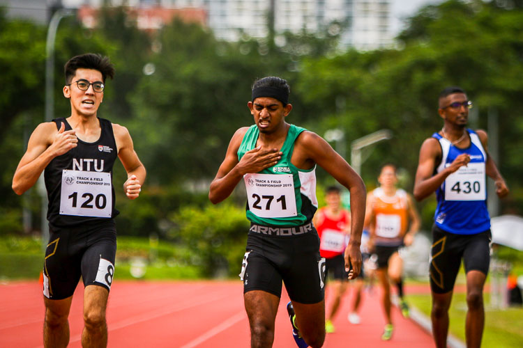 Kiran Raj s/o Suresh beating his chest after coming in first in his timed Men's 800m race. He would clinch silver with a time of 2:03.32 (Photo 1 © REDintern Young Tan)