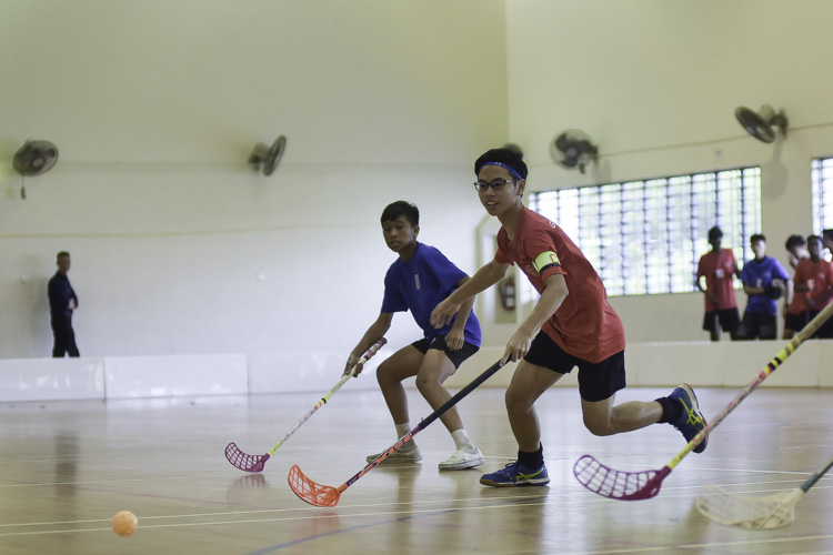 defender. St. Gabriel's Secondary beat St. Patrick's Secondary 17-1 to improve to a 2-1 win-loss record in the National B Division Floorball Championship. (Photo 1 © Iman Hashim/Red Sports)