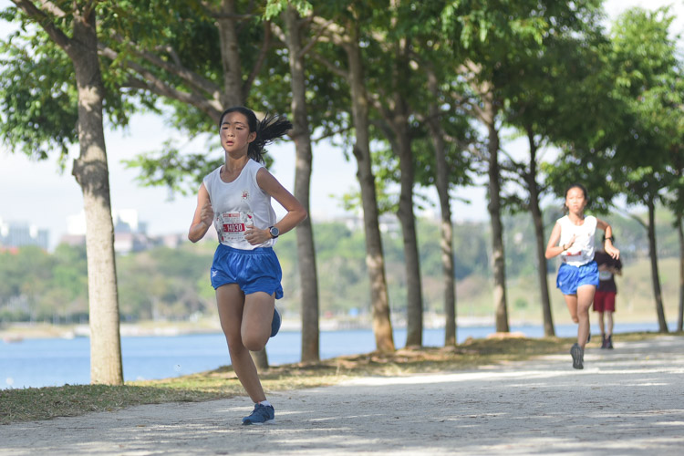 Chloe Tan (#14030) of CHIJ St. Nicholas Girls’ School finished eighth in the U14 Girls' race. (Photo 1 © Iman Hashim/Red Sports)