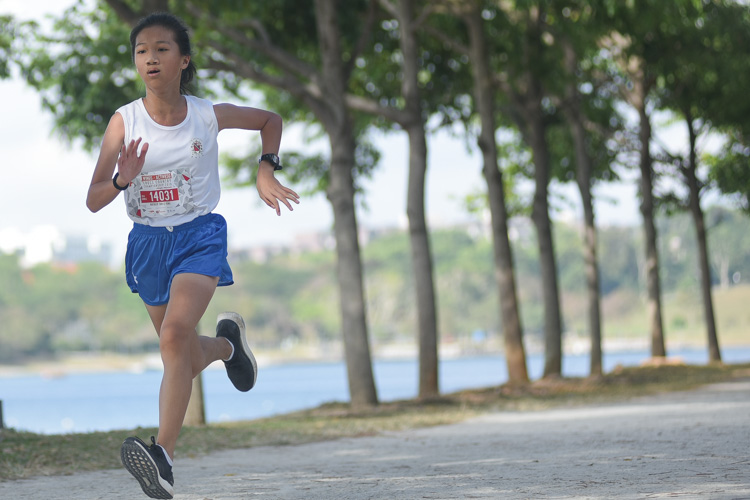 Natalie Tan (#14031) of CHIJ St. Nicholas Girls’ School placed ninth in the U14 Girls' race. (Photo 1 © Iman Hashim/Red Sports)