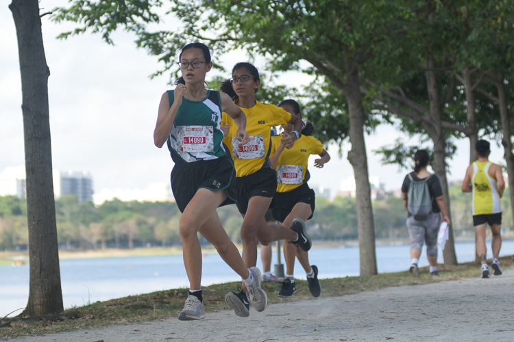 Ng Rui Shi (#14090) of RGS placed 14th while Sofia Sameer Grewal (#14006) of Cedar Girls' placed 13th in the U14 Girls' race. (Photo 1 © Iman Hashim/Red Sports)