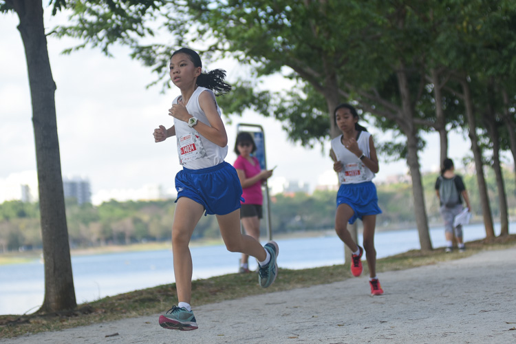 Janelle Tang (#14034) of CHIJ St. Nicholas Girls' placed 16th in the U14 Girls' race. (Photo 1 © Iman Hashim/Red Sports)