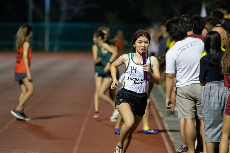 Alexandra Louise Wee running the 800m leg for Temasek Hall in the mixed medley event. (Photo 12 © REDintern Jared Khoo)