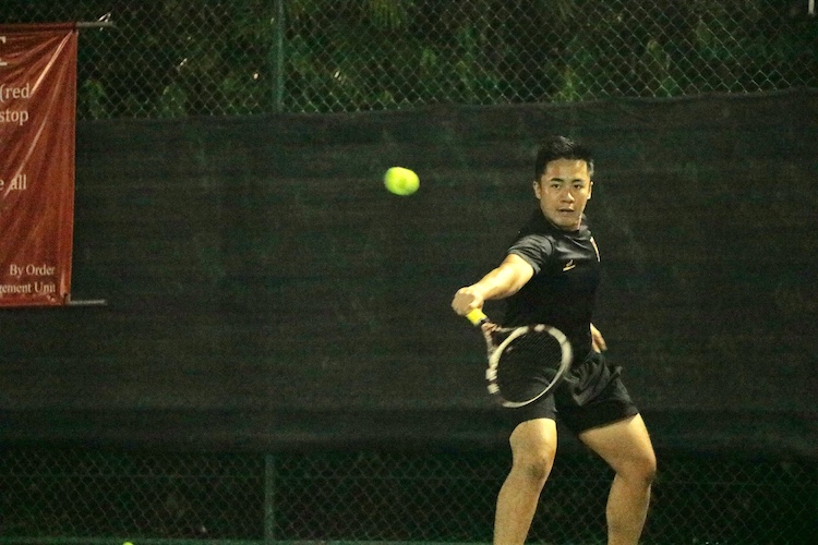 Damien Chong of Eusoff Hall in action against Temasek Hall during the Men’s Doubles match of the NUS IHG. (Photo 1 by RedIntern Julianna Jothi)