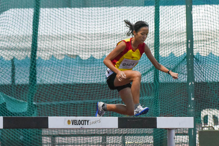 Clarice Lau of HCI clears the steeple. (Photo 3 © Iman Hashim/Red Sports)