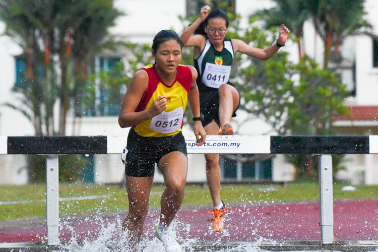 Tanya Kang (#512) of HCI and Xu Ziqian (#411) of RI go through the second last water jump. (Photo 12 © Iman Hashim/Red Sports)
