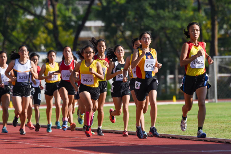 All runners bunched together from the get-go in the A Division girls' 3000m final. (Photo 5 © Iman Hashim/Red Sports)