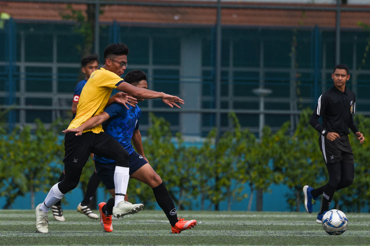 Muhammad Syafiee B Arman (SBW #9) tries to gain possession. (Photo 1 © Iman Hashim/Red Sports)