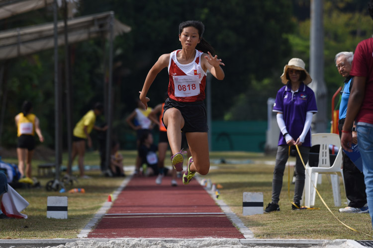 Evelyn Lai of National Junior College came in 10th in the B Division girls' triple jump with a distance of 9.34m. (Photo 1 © Iman Hashim/Red Sports)