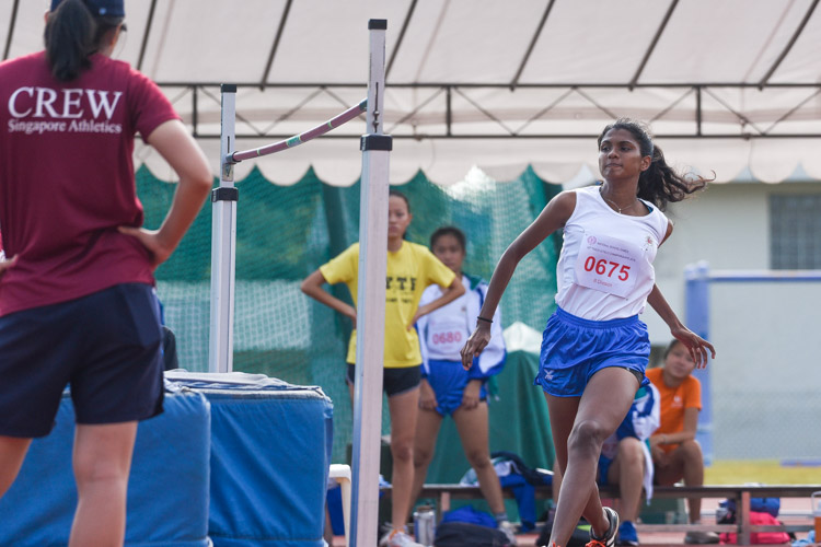 Rena Edwards of CHIJ St. Nicholas Girls' School won the silver on countback in the B Division girls' high jump. Along with third and fourth place, she had a final height of 1.50m. (Photo 10 © Iman Hashim/Red Sports)