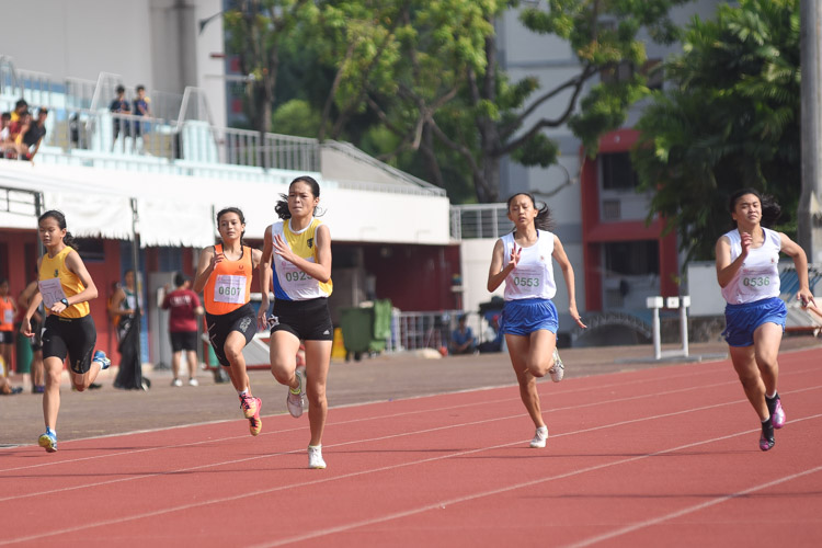 Competitors of the C Division girls' 200m final sprint to the finish. (Photo 3 © Iman Hashim/Red Sports)