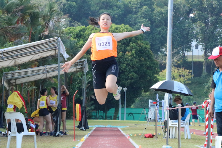 Rachel Cheong of  Singapore Sports School (SSP) in action is placed third overall with a distance of 4.99m.