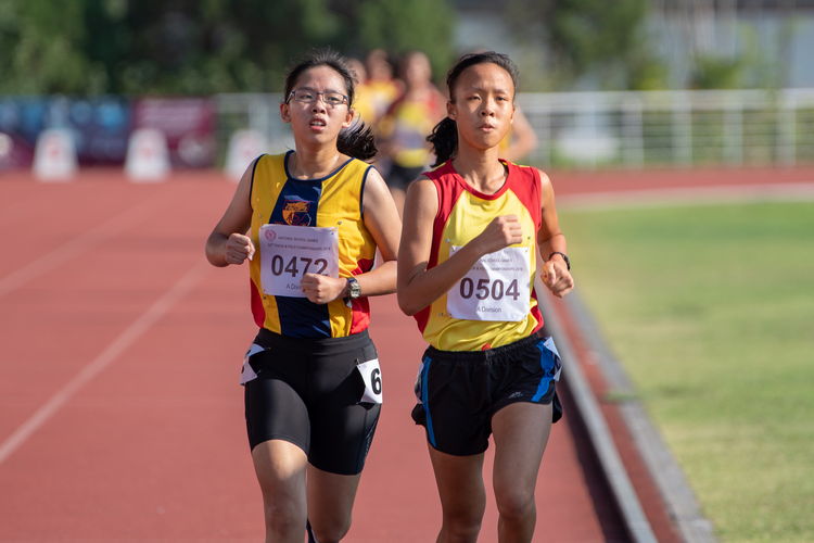 Left to right: Chua Hsi-Ern Caylee of ACJC and Clarice Lau Jia Yun of HCI. The two girls started the 3000m A Division Girls' final almost side-by-side.