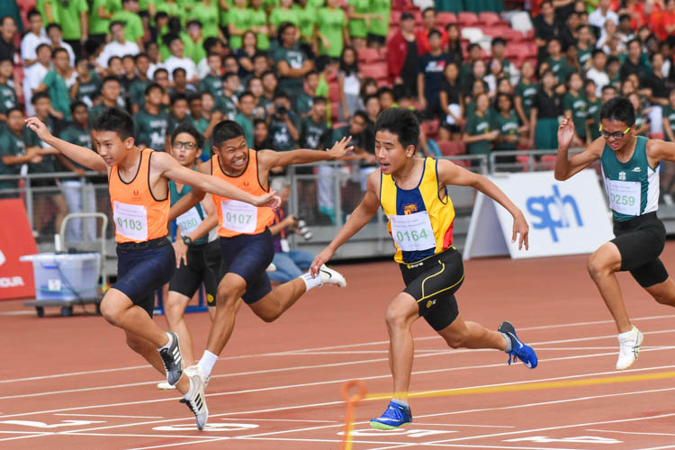 Xavier Tan (#164) of ACS(I) won the C Division boys' 100m final in 11.71s, finishing just eight hundredths of a second ahead of Huang Weijun (#103) of SSP, who clocked 11.79s to finish second. (Photo X © Iman Hashim/Red Sports)