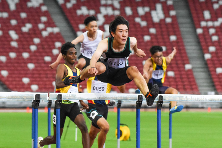 Matz Chan (#123) of RI won the A Division boys' 110m hurdles final in 15.70 seconds to seal a double hurdles gold, after also winning the 400m hurdles event. (Photo 1 © Iman Hashim/Red Sports)