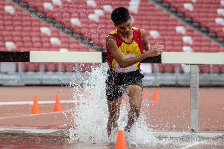 Joshua Rajendran (#244) of HCI finished second in the A Division Boys' 3000m steeplechase final with a time of 10:36.91.