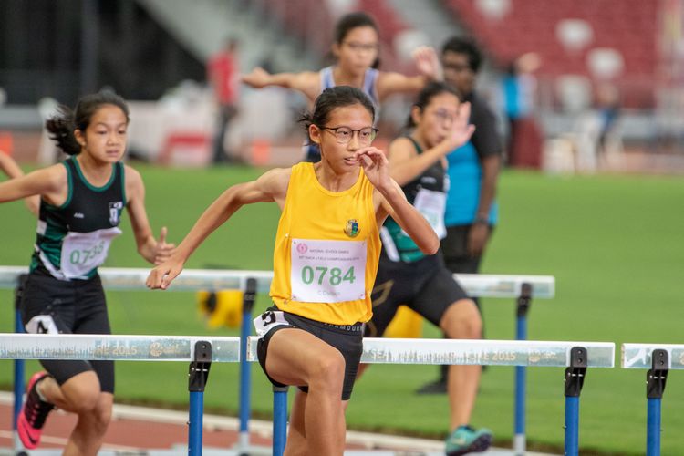Ashley Tan (#784) of Cedar Girls' Secondary School finished in first place in the C Division Girls' 80m hurdles final with a time of 00:12.56.